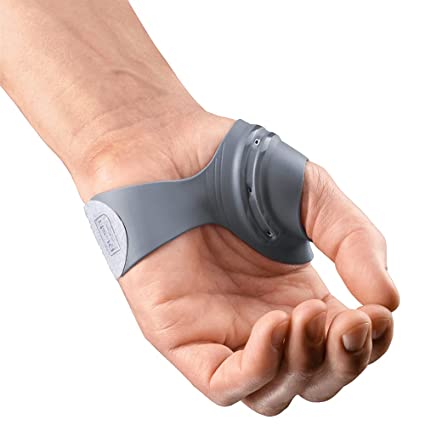 Image shows hand with grey push metagrip brace on a white background 